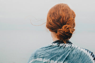 Bride-to-be preparing hair for wedding day with best hair care tips